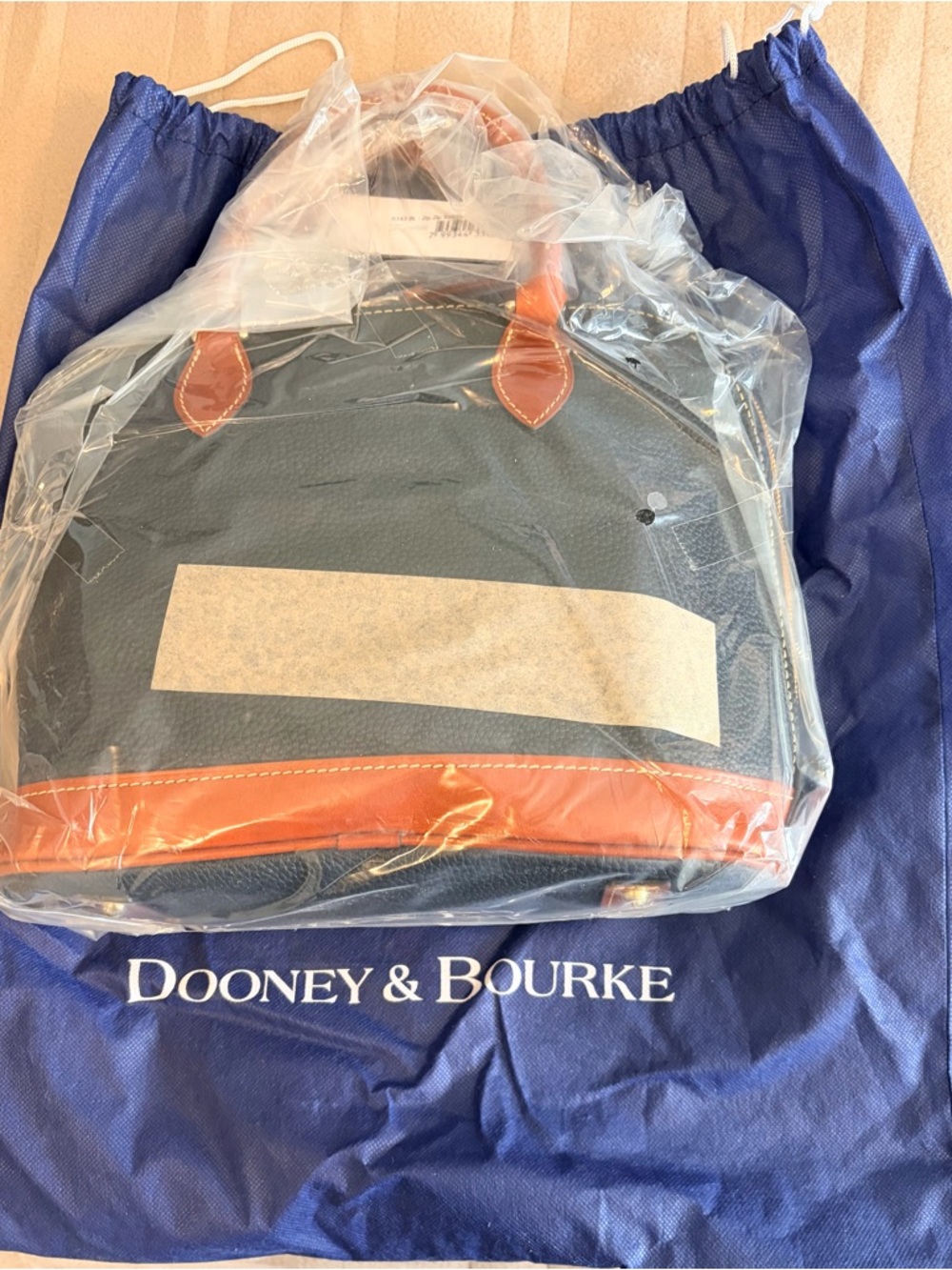 Dooney & Bourke Black Pebbled Leather Satchel with Brown Trim